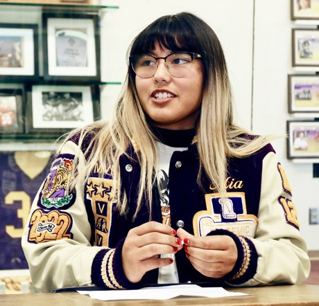 Mia Meno, shown after signing her letter-of-intent to wrestle at Ottawa University in Arizona.